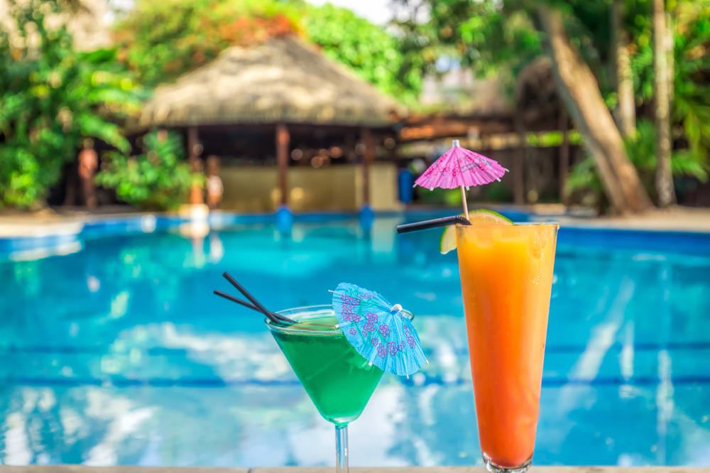 Sanctuary Rarotonga_Pool + cocktail_2018.jpg