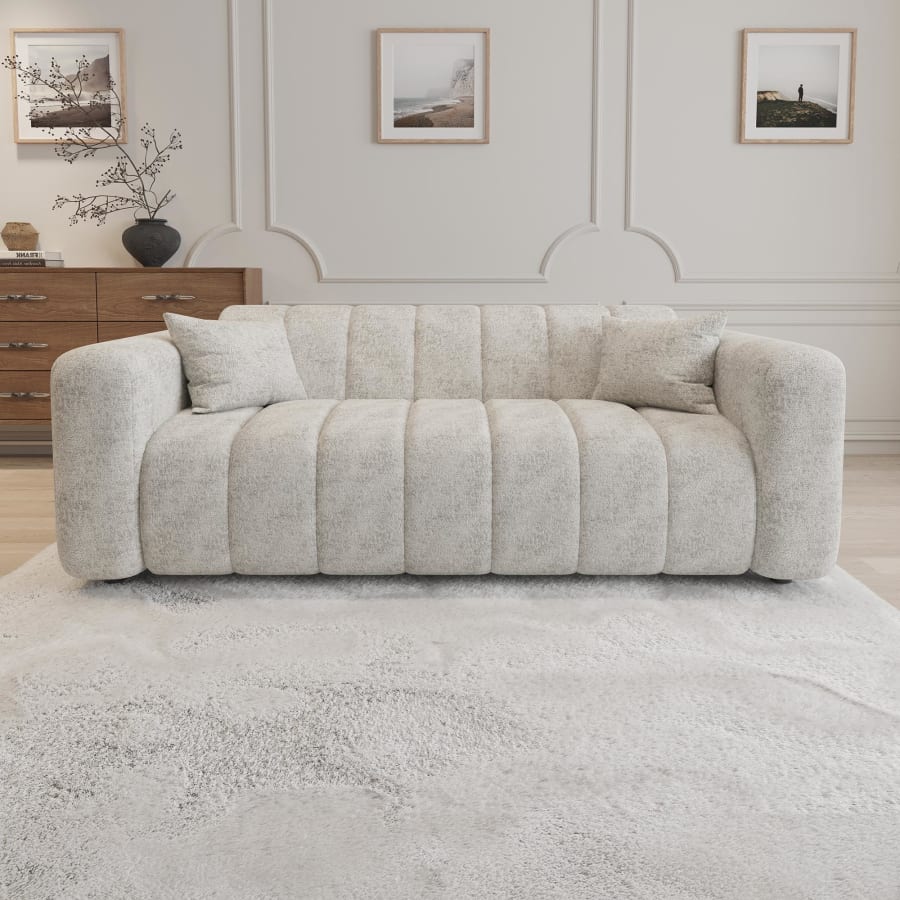 Canap&eacute; 3 places en tissu matelass&eacute; beige