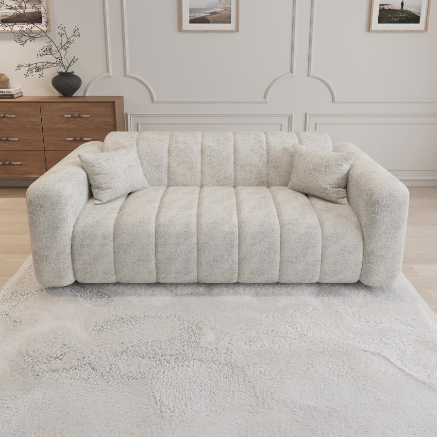 Canap&eacute; 3 places en tissu matelass&eacute; beige