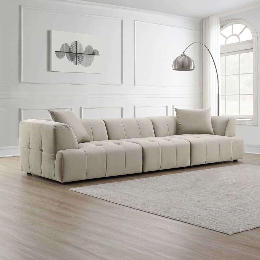 Canap&eacute; capitonn&eacute; 4 places en velours beige