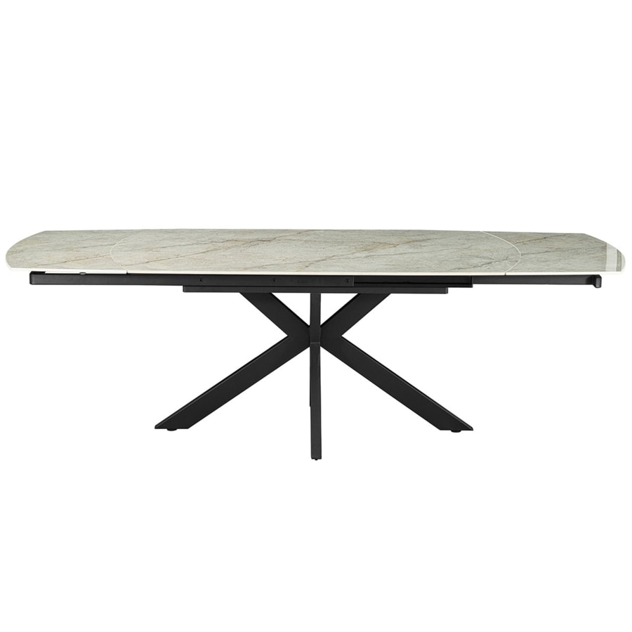 Table &agrave; manger extensible en pierre fritt&eacute;e beige et m&eacute;tal noir