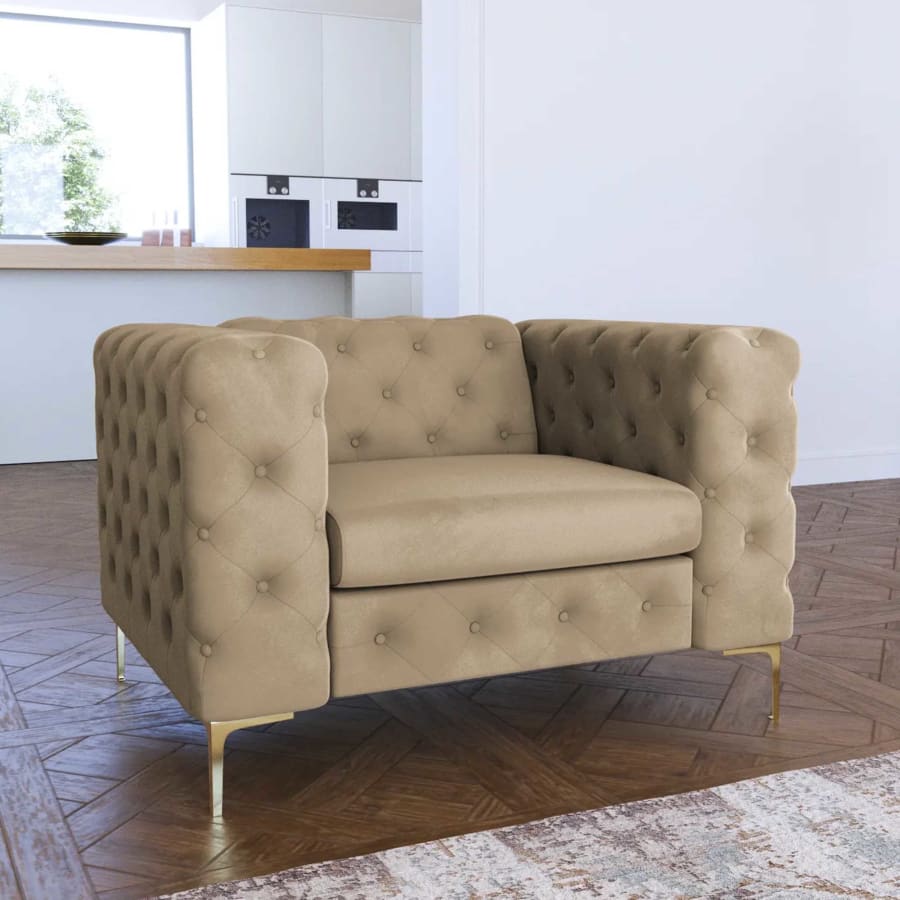 Fauteuil chesterfield en velours beige