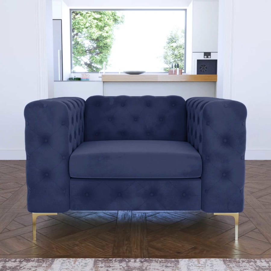 Fauteuil chesterfield en velours bleu