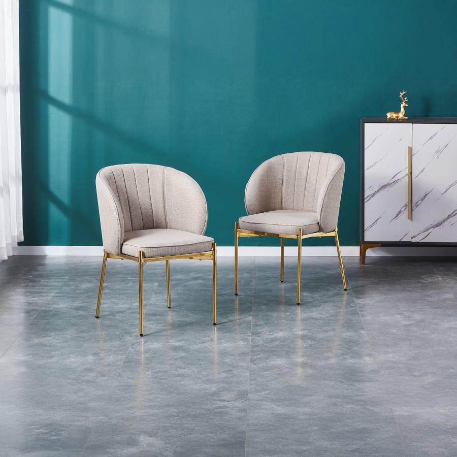 Lot de 2 chaises en tissu beige pieds en métal doré