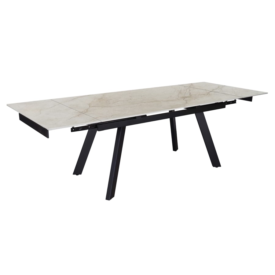 Table extensible en pierre fritt&eacute;e beige pieds en m&eacute;tal noir 160-240 cm