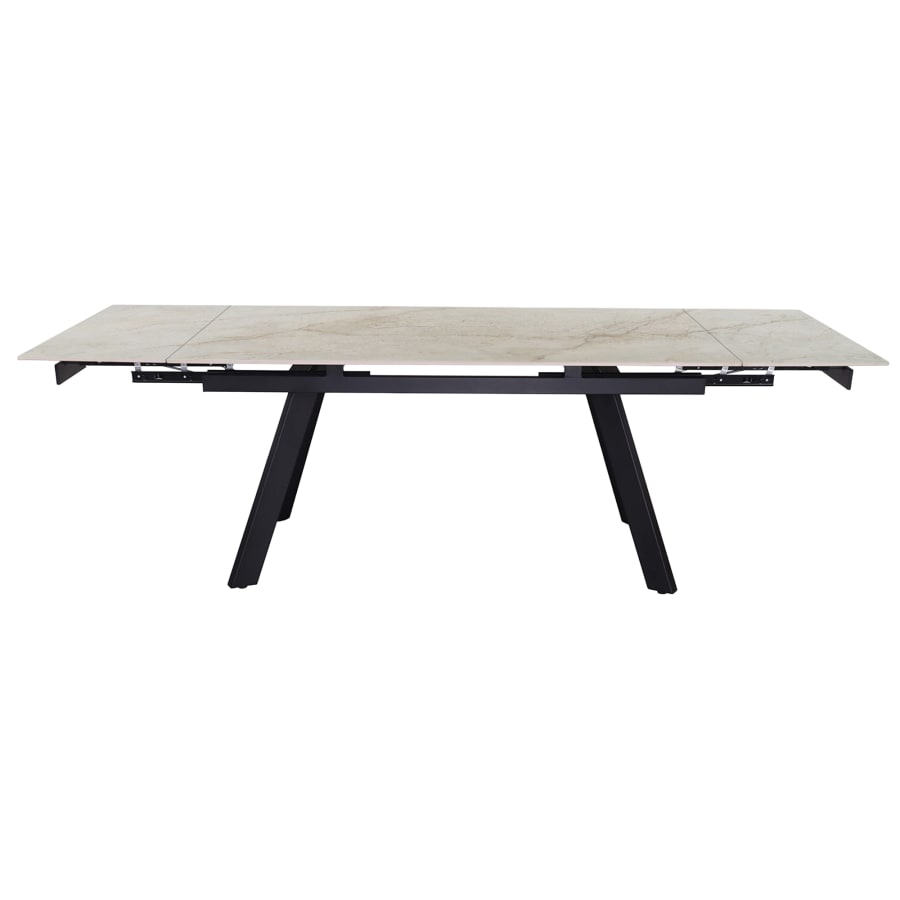 Table extensible en pierre fritt&eacute;e beige pieds en m&eacute;tal noir 160-240 cm