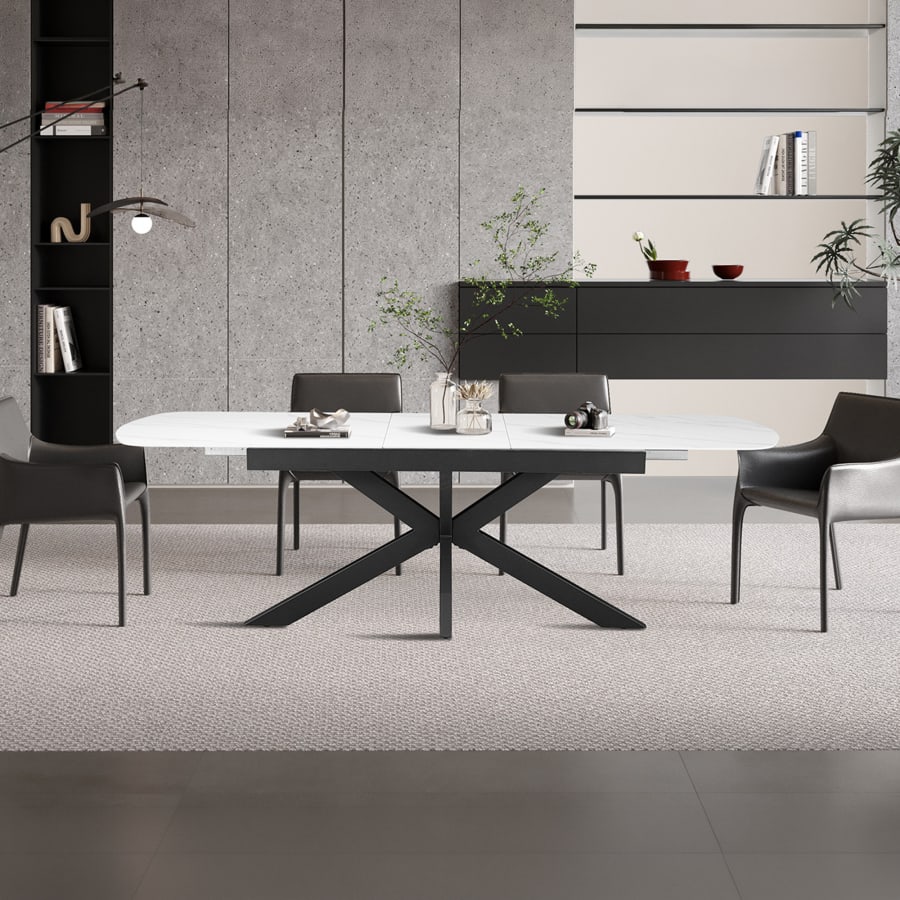 Table extensible rectangulaire en pierre fritt&eacute;e blanc pieds en m&eacute;tal noir 180-220