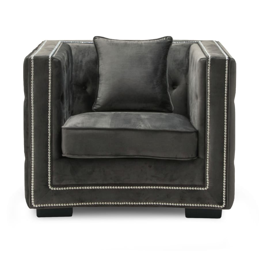 Fauteuil capitonné chesterfield en velours gris