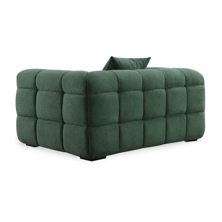 Fauteuil en tissu vert