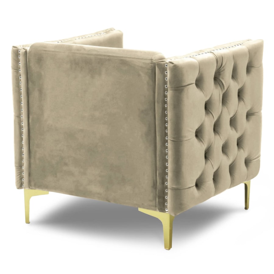 Fauteuil capitonné en velours beige