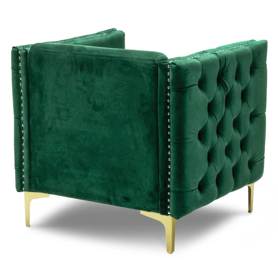 Fauteuil capitonné en velours vert