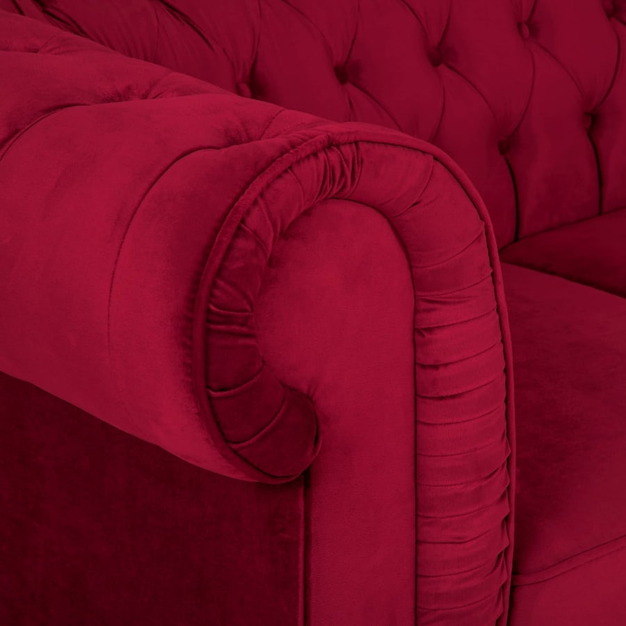 Fauteuil chesterfield en velours rouge