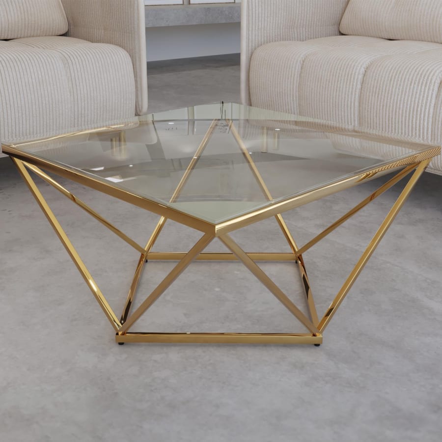 Table basse design en verre et métal doré