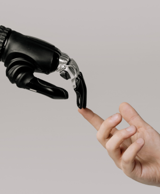 Robotic and human hand touching