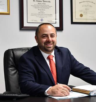 Joey Gurian sitting at his desk