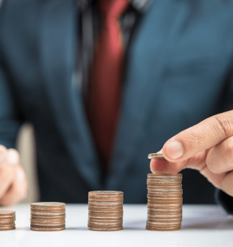 Man Stacking Pennies