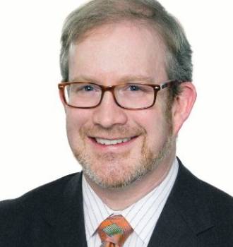 Headshot of attorney Max Thomas