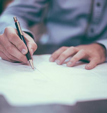 Attorney signing documents