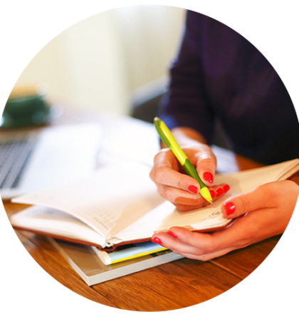 Woman filling out a schedule