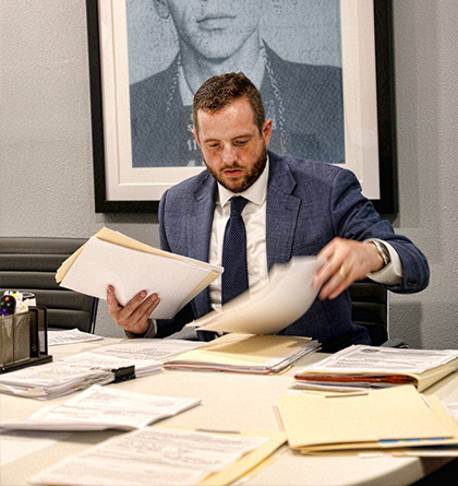 Ryan Roth working at his desk