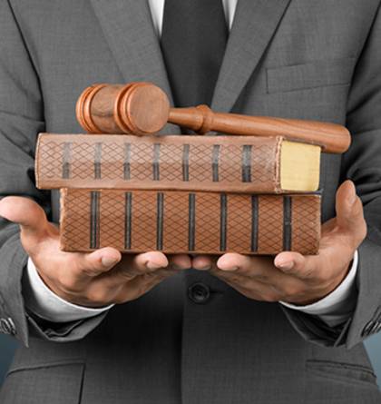 lawyer with books and gavel