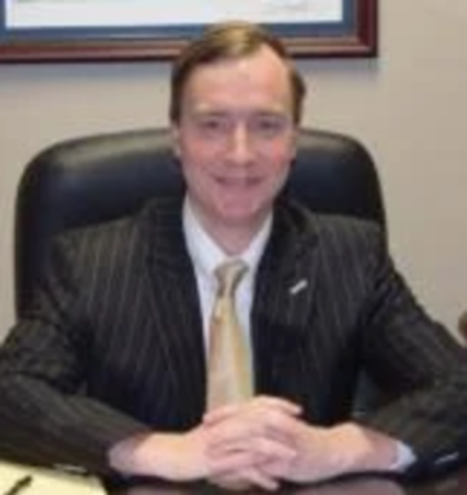Thomas Springer sitting at a desk