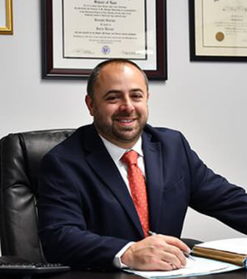 Joey Gurian sitting at his desk