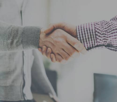 two men shaking hands