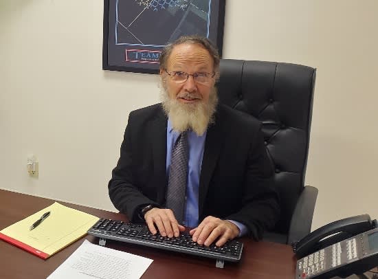 Peter J. Snyder at his desk