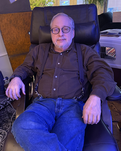 Attorney William F. Kunofsky leaning back in his desk chair
