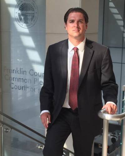 Attorney Ryan Green on Stairs