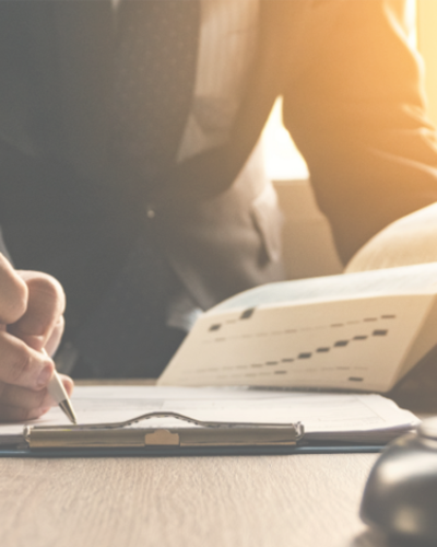 Man Signing a Document