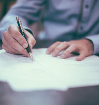 Attorney filling out paperwork