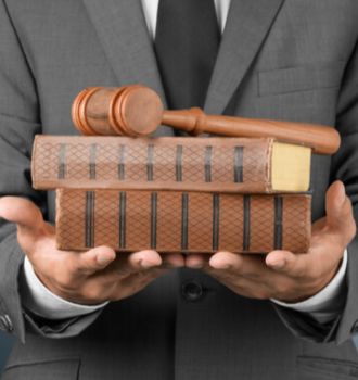 Attorney holding books