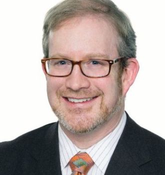 Headshot of attorney Max Thomas