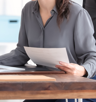 Young female notary working in office