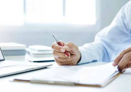 An attorney scanning through documents.