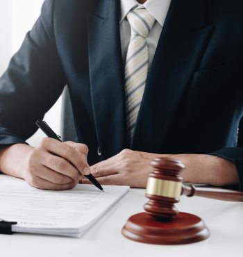 Man signing in document