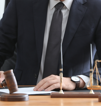 Young male notary working in office