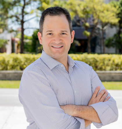 Miguel Brizuela smiling