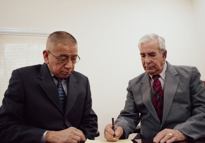 Attorney Greenblat and Oscar working on a contract