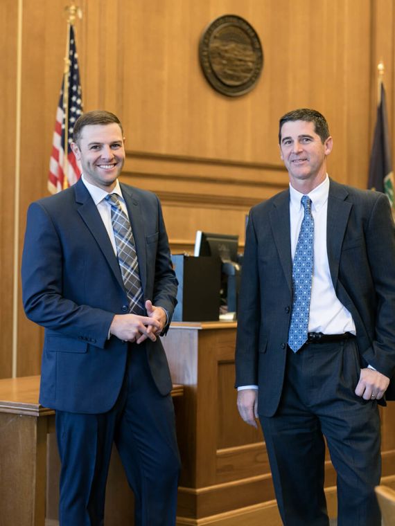 Cross and Adam in the court room