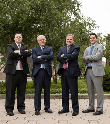 Attorneys Paul L. Frampton, John J. Polak, Mark A. Atkinson, & John-Mark Atkinson