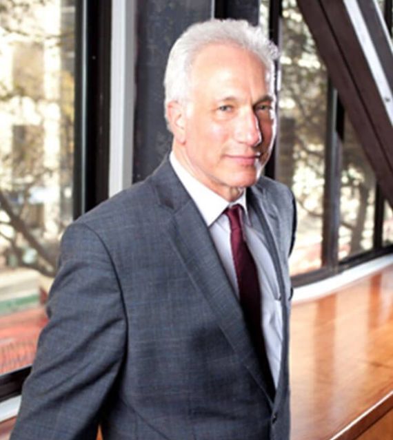 Attorney Bennett M. Cohen Standing Next to the Window