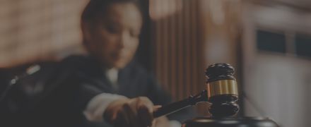 Honorable Female Judge Pronouncing Sentence, striking Gavel.