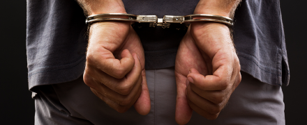 A man in handcuffs.