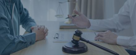 Attorney or judge provides legal advice to the client in the courtroom