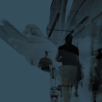 A man on his phone in an office setting