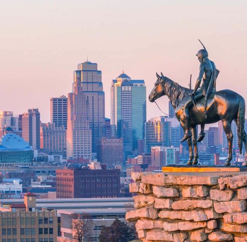 View of Kansas City skyline with a Native American Statue