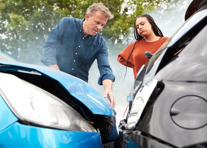 Two people involved in a fender bender.